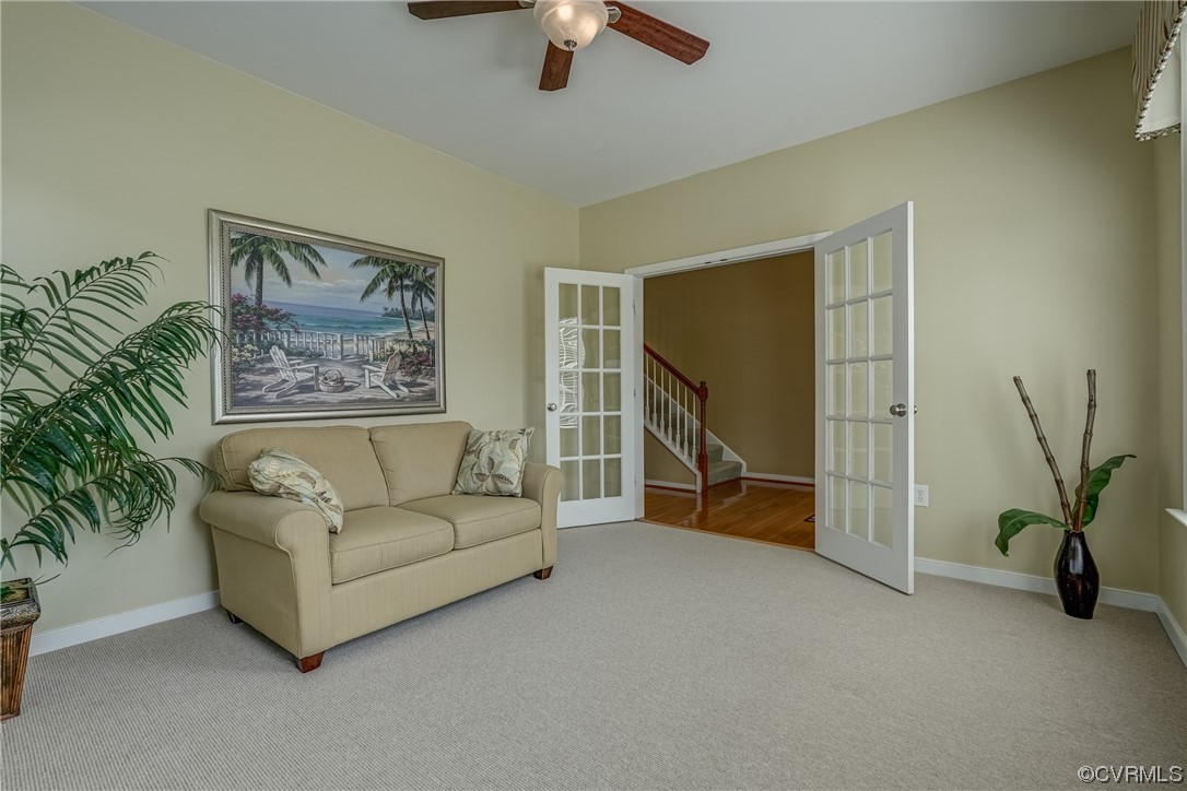 2407 Cascade Meadows Drive Midlothian, VA 23112 - Photo 9 of 48 a living room with furniture and a ceiling fan