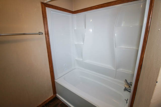 4 Broyles Road Phenix City, AL 36869 - Photo 15 of 15 a bathroom with a bathtub