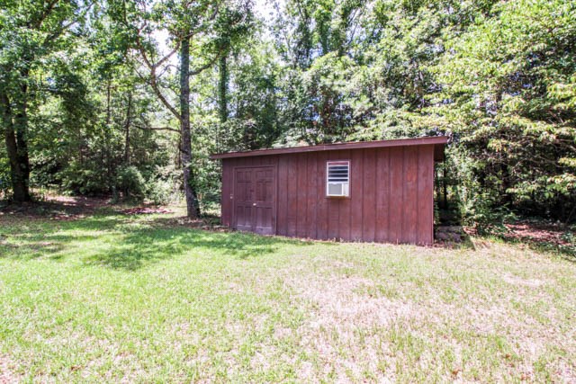 4 Broyles Road Phenix City, AL 36869 - Photo 4 of 15 a fire hydrant in the middle of a field