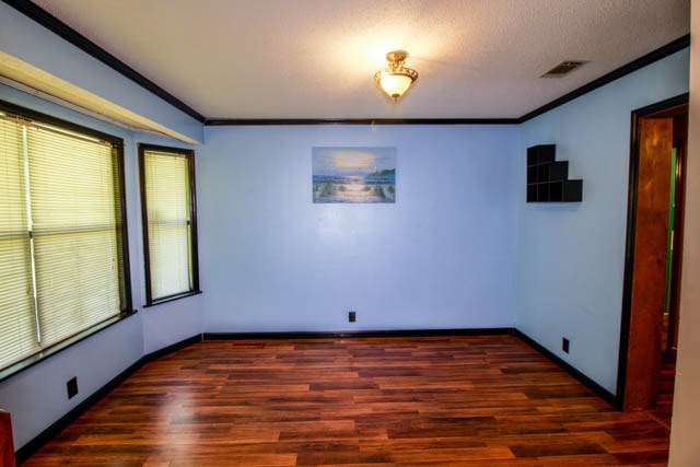 4 Broyles Road Phenix City, AL 36869 - Photo 8 of 15 a view of room with window and wooden floor