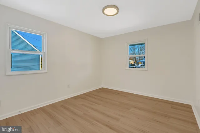 a bathroom with a sink a bathtub and shower