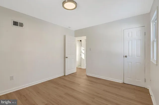 a bathroom with a sink toilet and mirror
