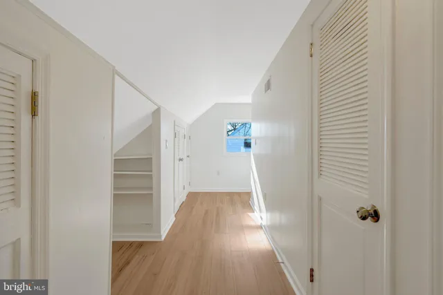 a view of entryway with wooden floor
