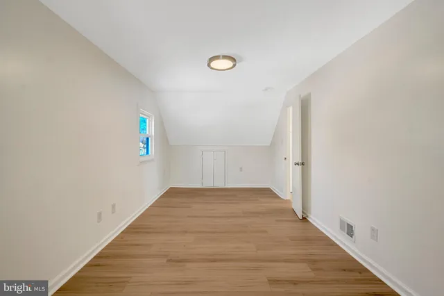 a view of a house with a snow in the yard
