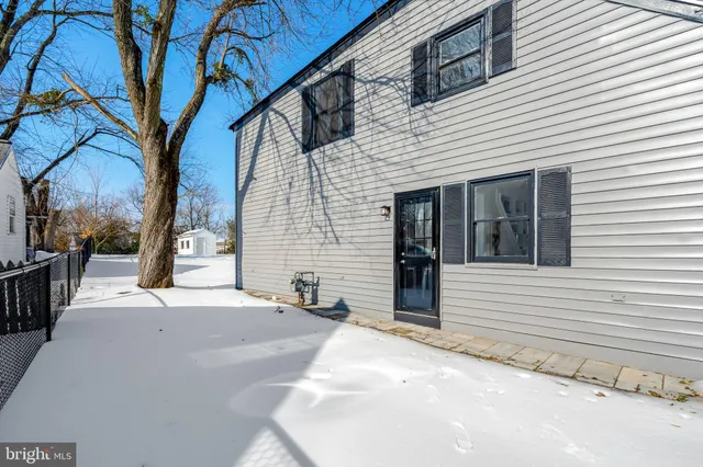 a view of a door and a window