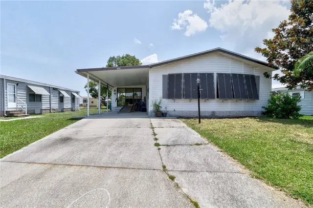 a house with yard in front of it