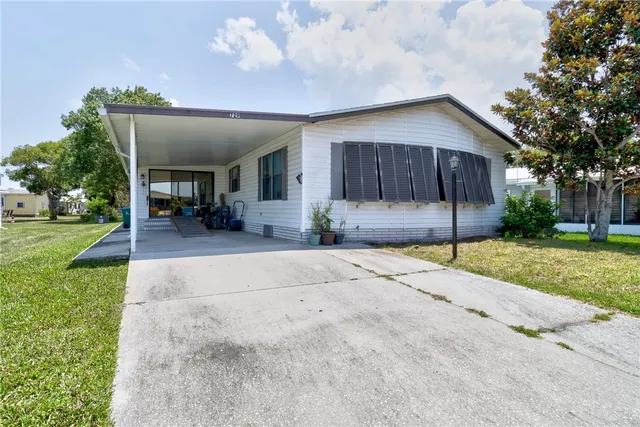 a house with yard in front of it