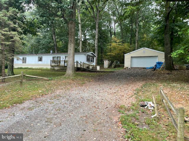 245 Balance Meeting Road Peach Bottom, PA 17563 - Photo 1 of 1 a view of a house with a yard and sitting area