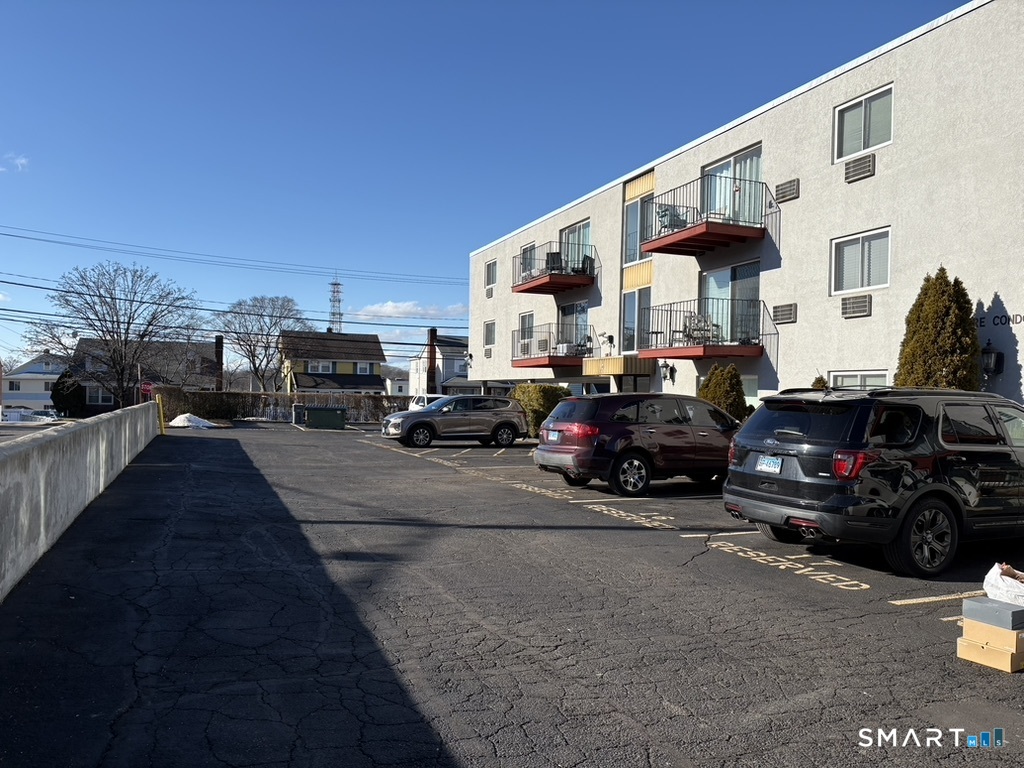 12 Tuttle Street, Unit 1C Stamford, CT 06902 - Photo 1 of 14 a view of a street with cars