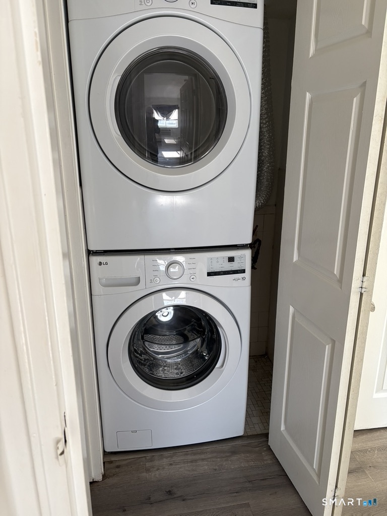 12 Tuttle Street, Unit 1C Stamford, CT 06902 - Photo 11 of 14 a utility room with dryer and washer