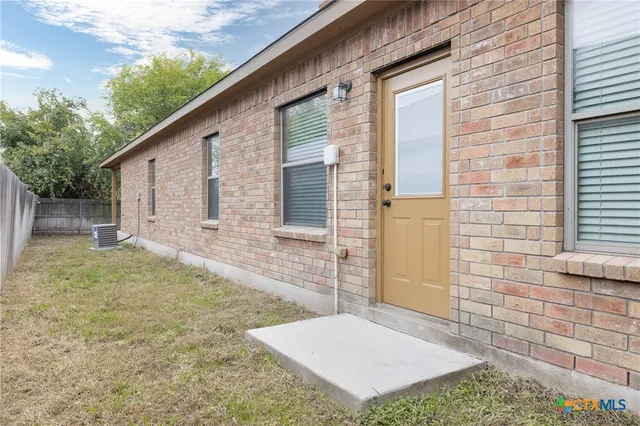 a view of backyard of house