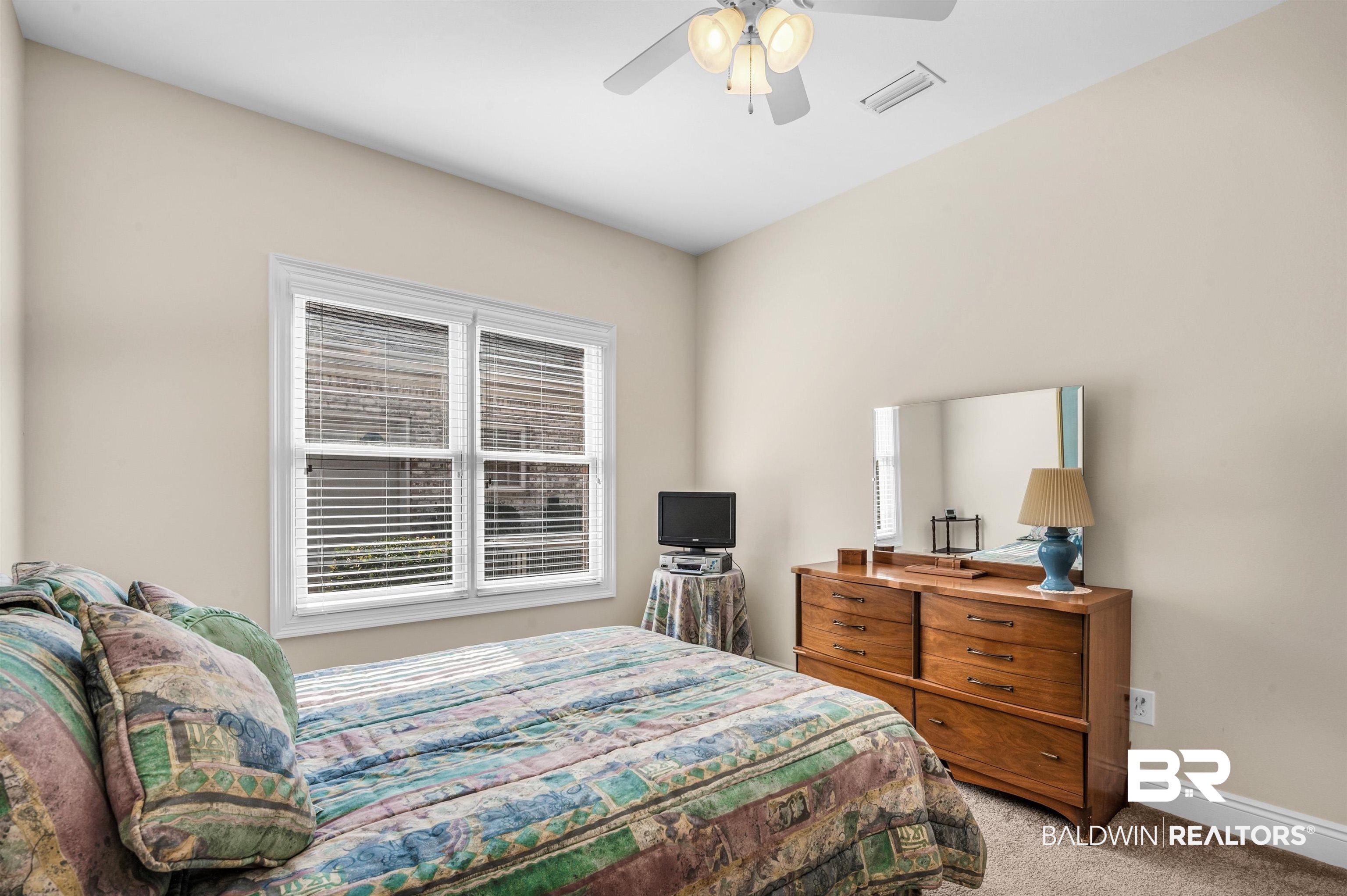 22739 Inverness Way Foley, AL 36535 - Photo 44 of 80 Bedroom with light carpet, baseboards, and ceiling fan