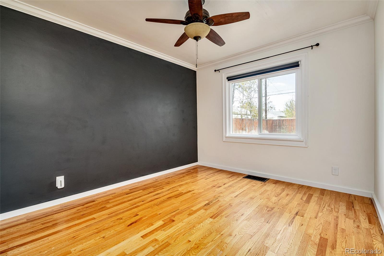 1250 Emporia Street Aurora, CO 80010 - Photo 19 of 33 a view of an empty room with a window