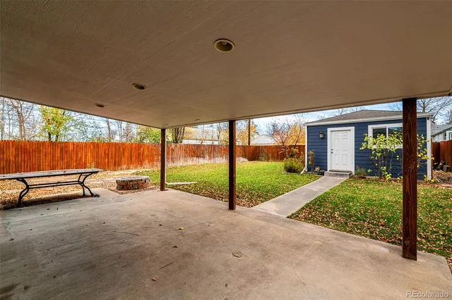 a view of a garden with patio