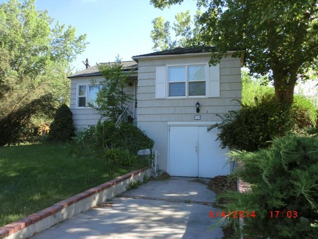 979 Novelly Drive Reno, NV 89503 - Photo 1 of 1 a front view of a house with a garden