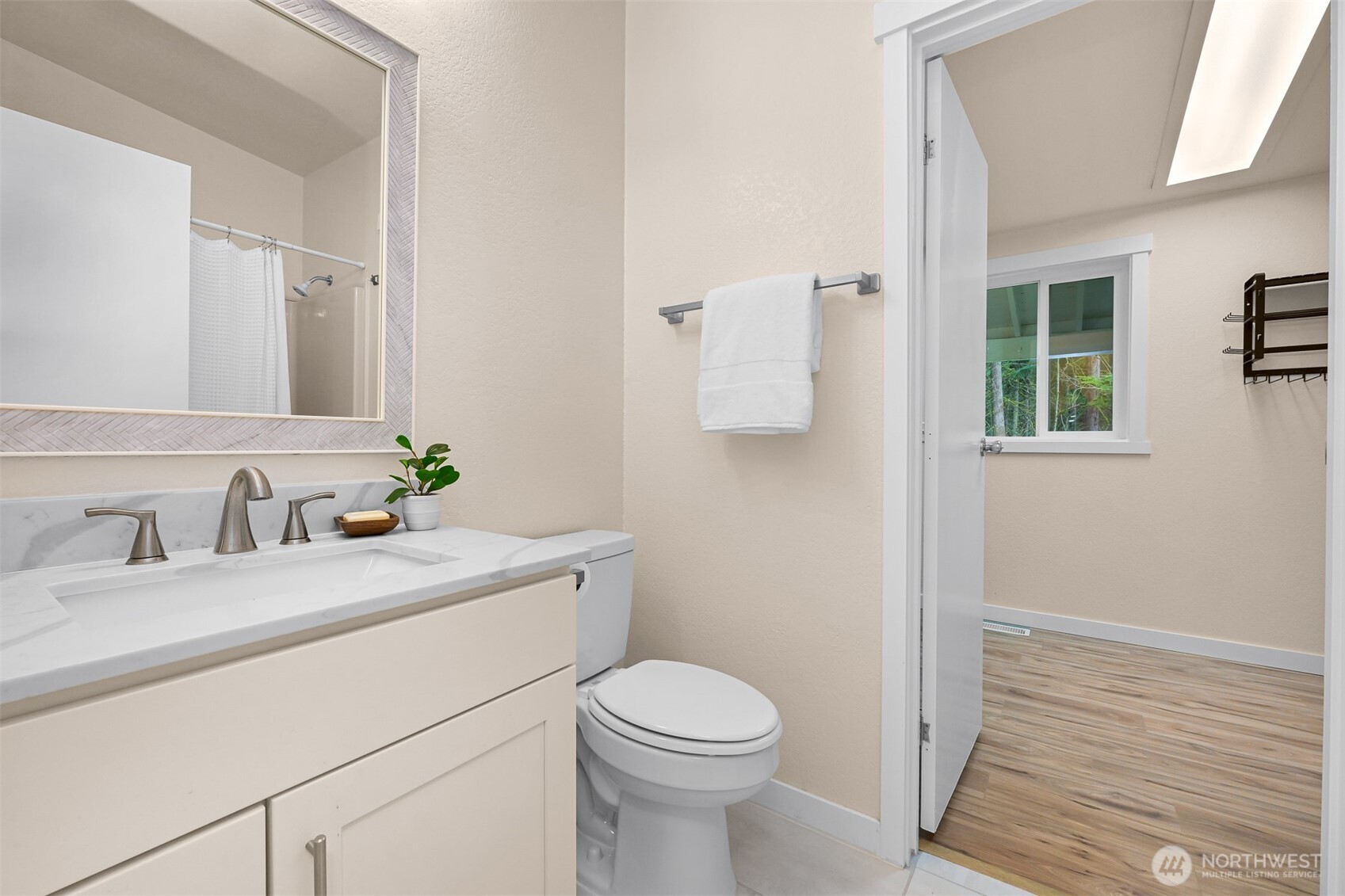 6159 Cedar Lane Maple Falls, WA 98266 - Photo 26 of 31 a bathroom with a granite countertop toilet sink and mirror