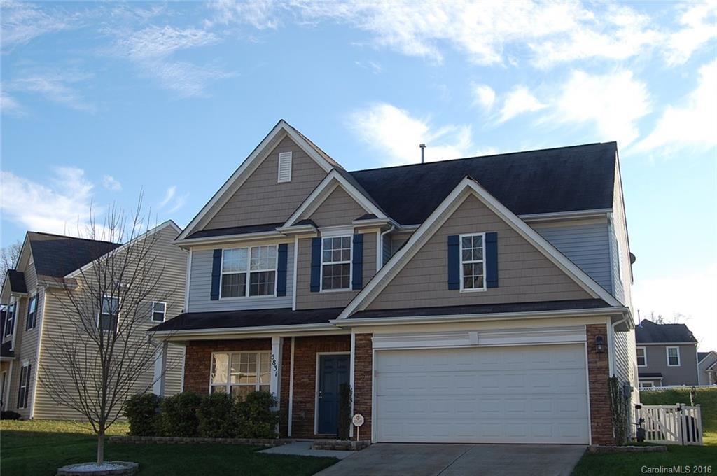 5831 Ringneck Road Charlotte, NC 28216 - Photo 2 of 20 a front view of a house with a yard