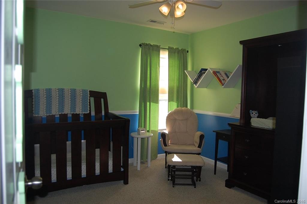 5831 Ringneck Road Charlotte, NC 28216 - Photo 17 of 20 a living room with furniture and a window