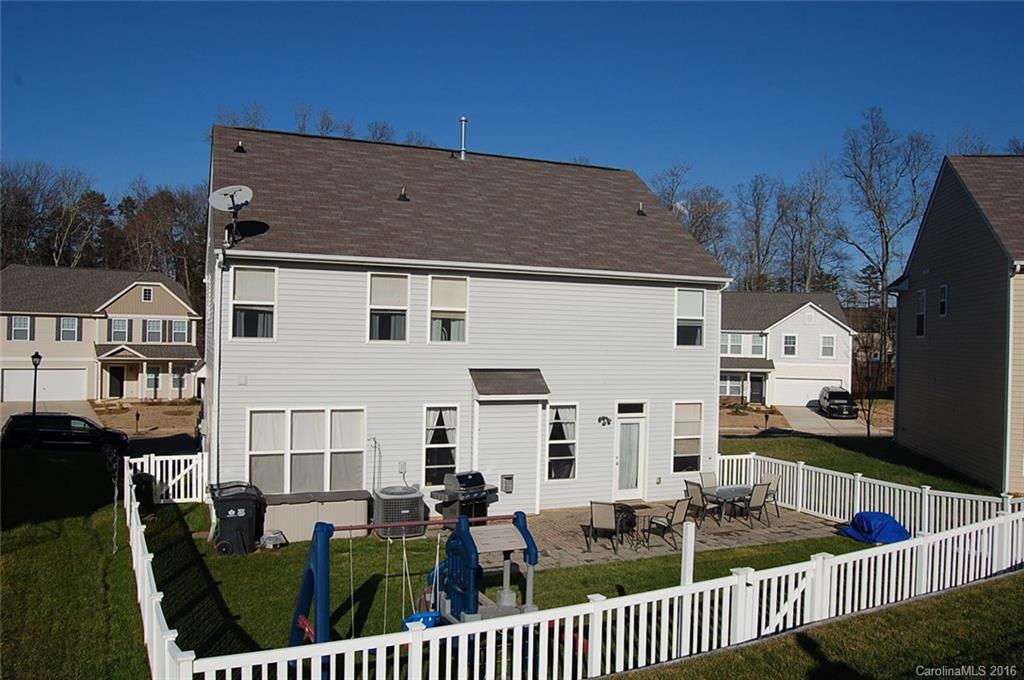 5831 Ringneck Road Charlotte, NC 28216 - Photo 20 of 20 a view of a house with backyard and porch