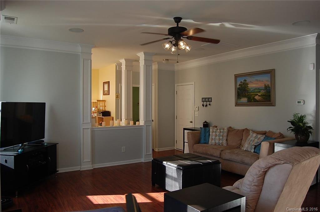 5831 Ringneck Road Charlotte, NC 28216 - Photo 7 of 20 a living room with furniture and a flat screen tv