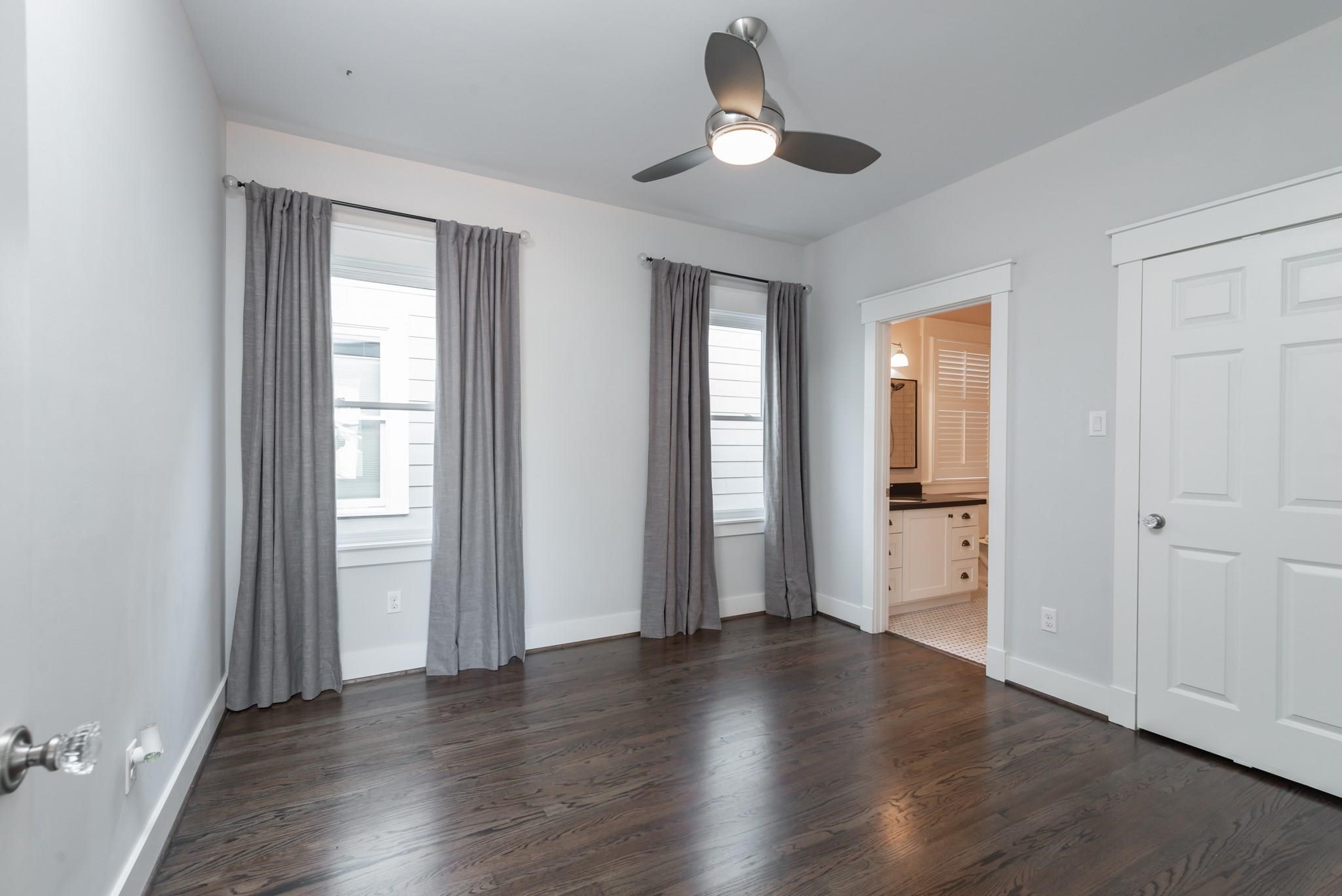 734 Allston Street, Unit B Houston, TX 77007 - Photo 17 of 28 The first secondary bedroom is light and bright, has an adjoining bath that is shared with the other secondary bedroom.