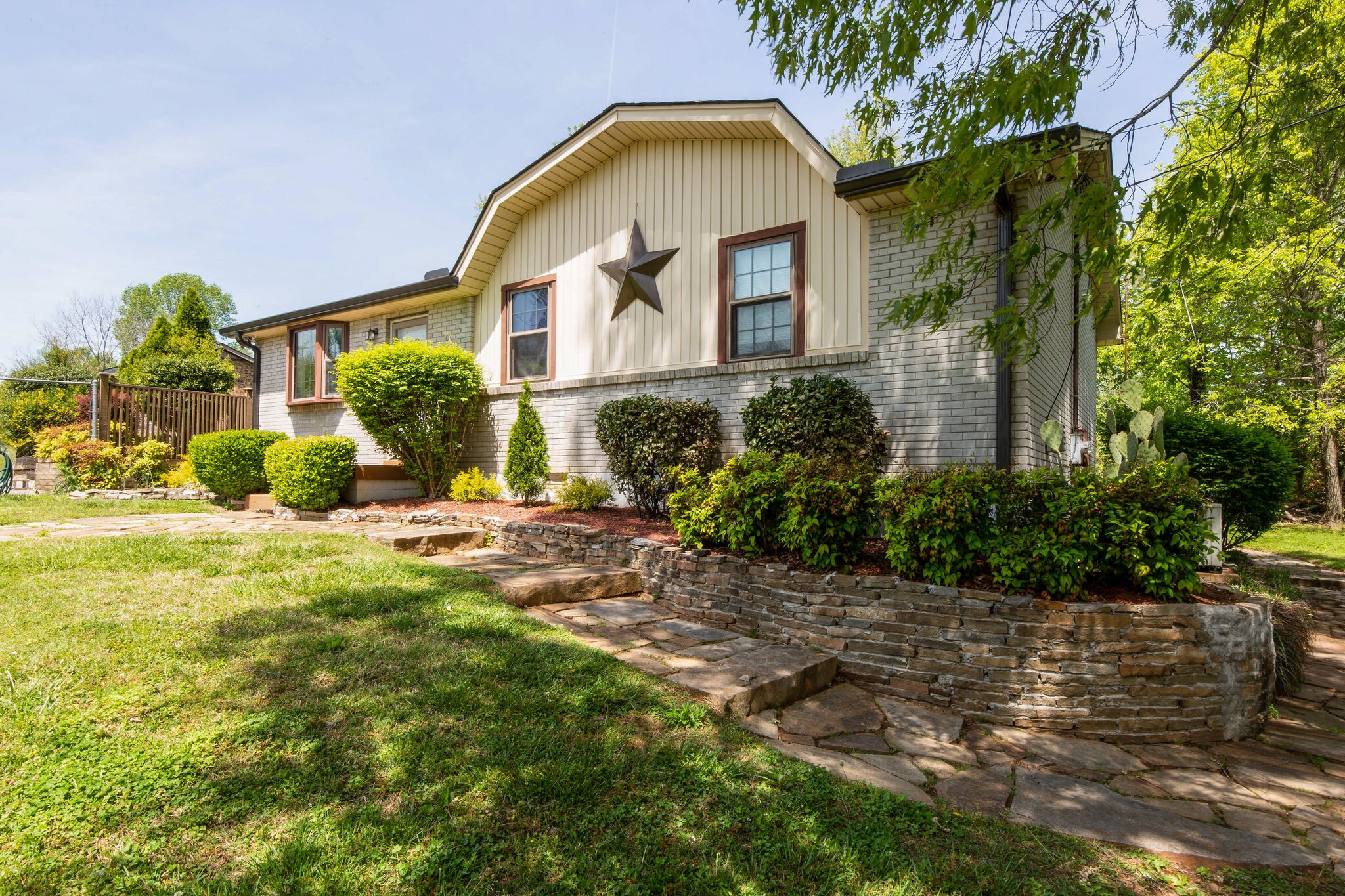 7813 Chester Road Fairview, TN 37062 - Photo 2 of 23 a view of a house with a backyard