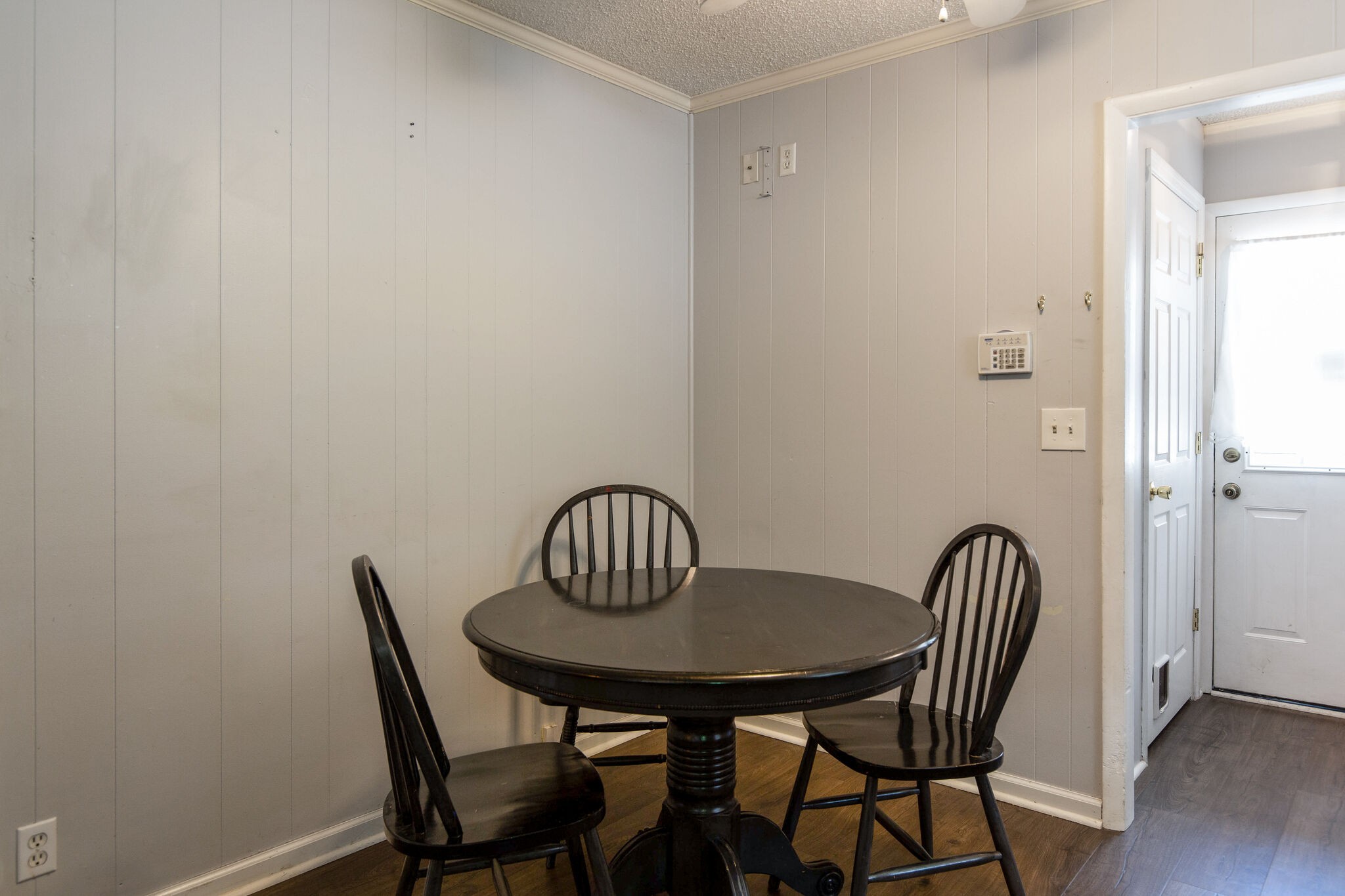 7813 Chester Road Fairview, TN 37062 - Photo 11 of 23 a view of a dining room with furniture and wooden floor