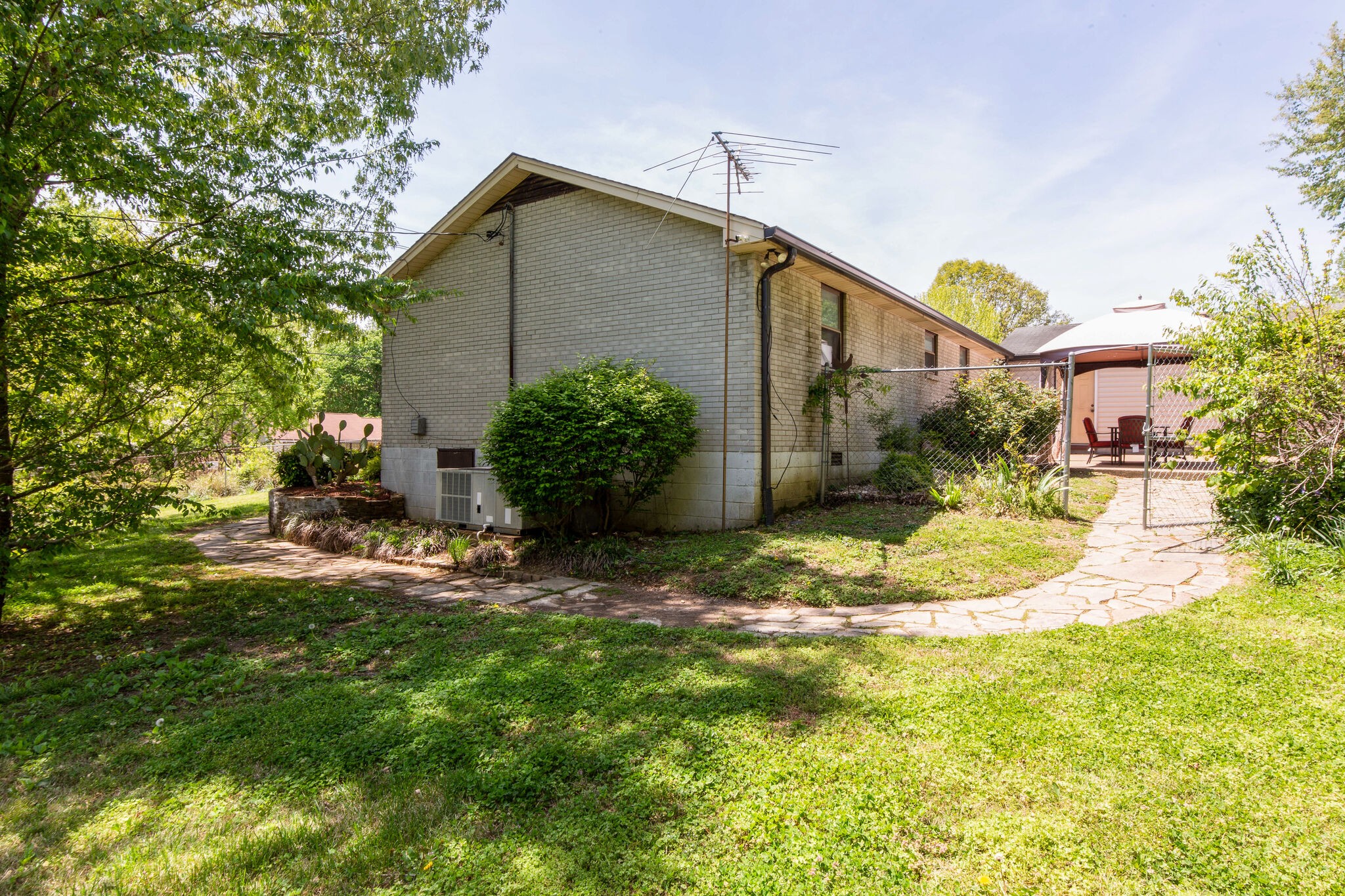7813 Chester Road Fairview, TN 37062 - Photo 18 of 23 a view of a house with a yard