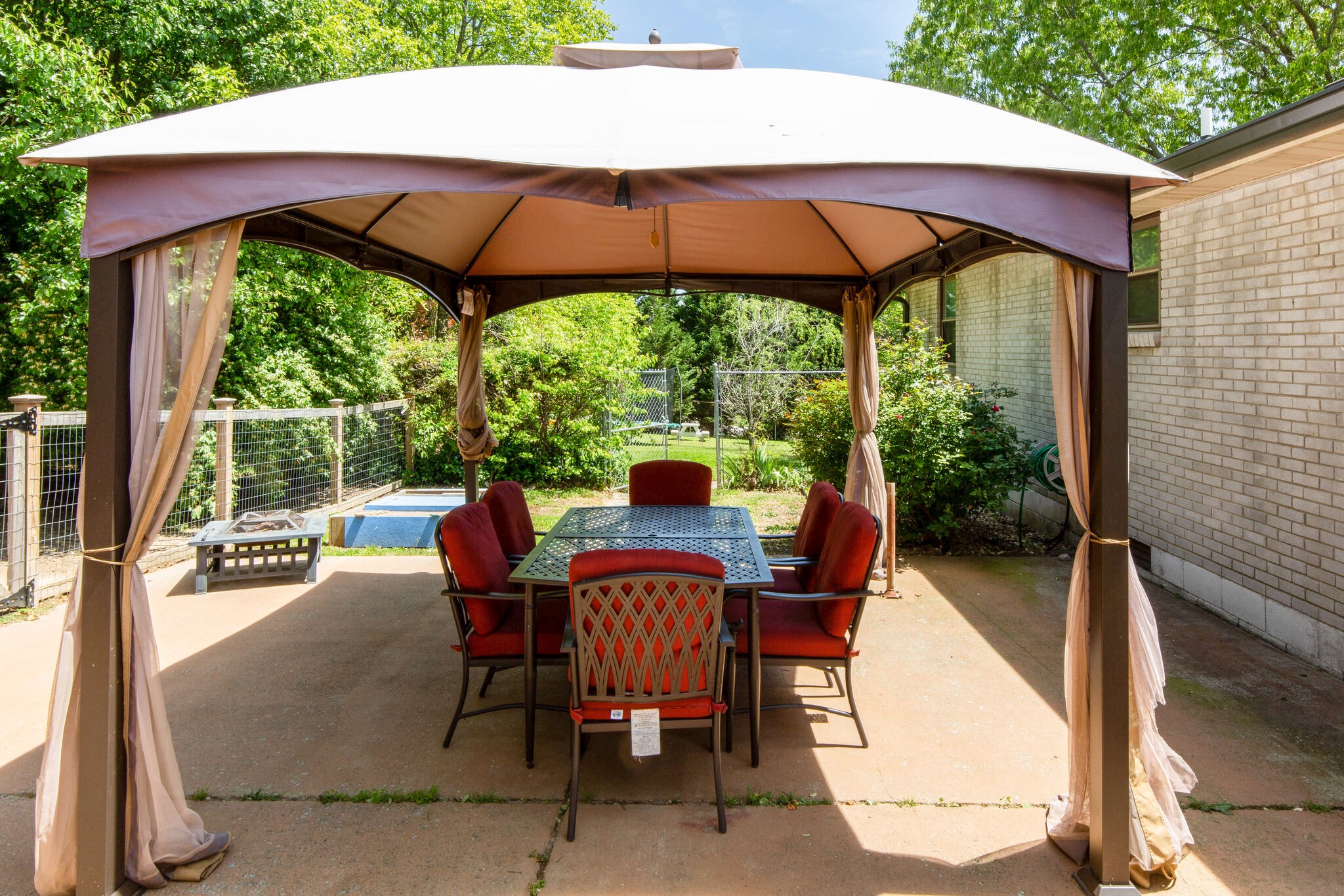 7813 Chester Road Fairview, TN 37062 - Photo 19 of 23 a view of a patio with furniture and a backyard