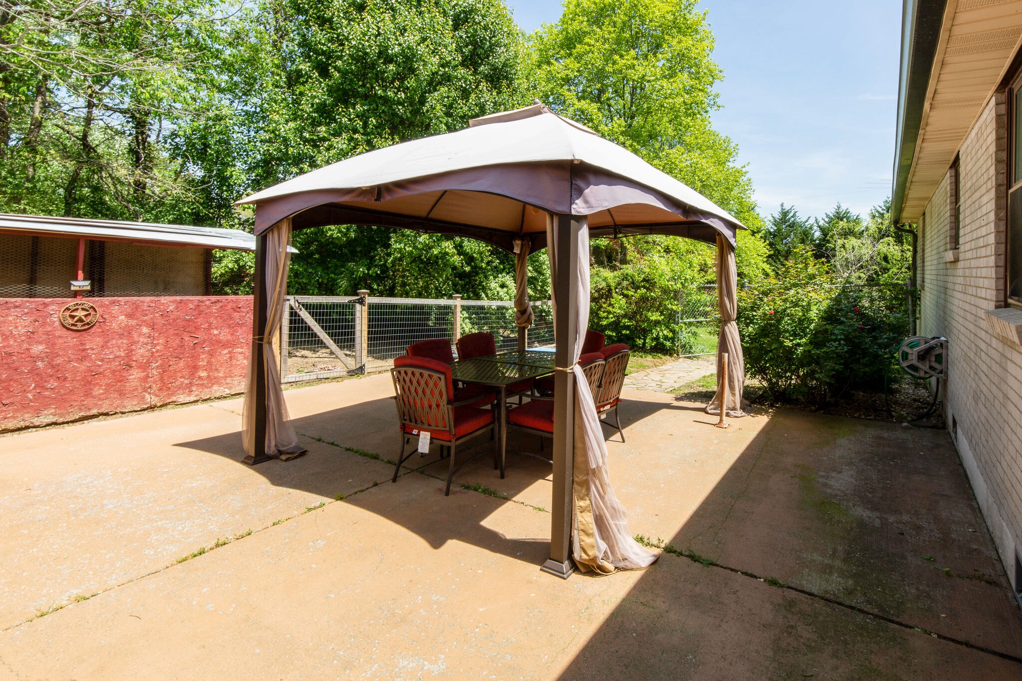 7813 Chester Road Fairview, TN 37062 - Photo 21 of 23 a view of backyard with plants and outdoor seating
