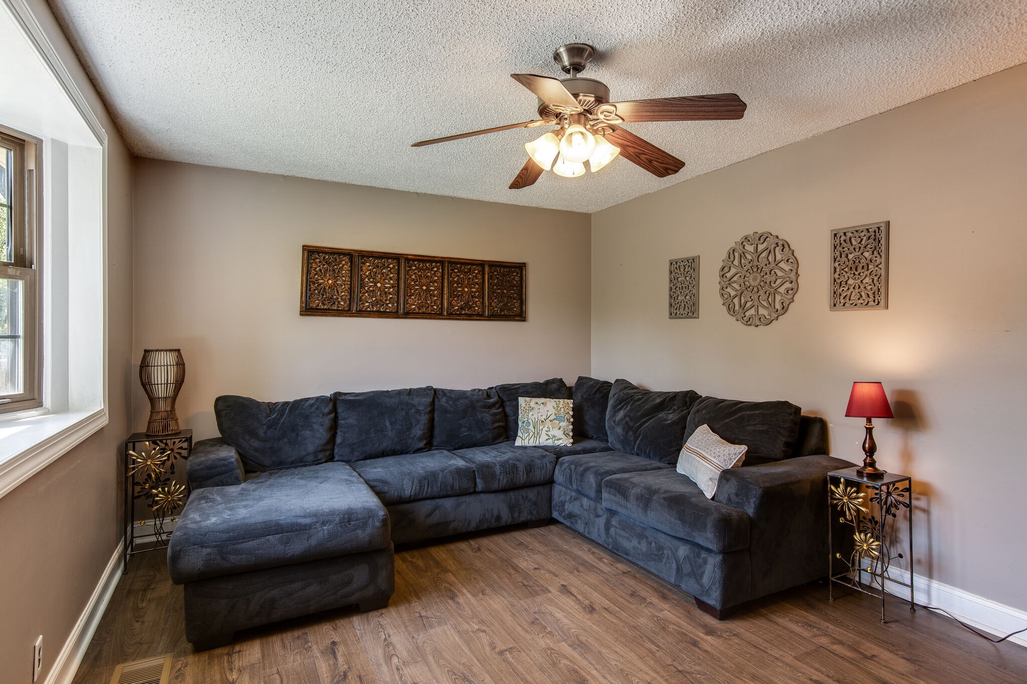 7813 Chester Road Fairview, TN 37062 - Photo 6 of 23 a living room with furniture and a flat screen tv