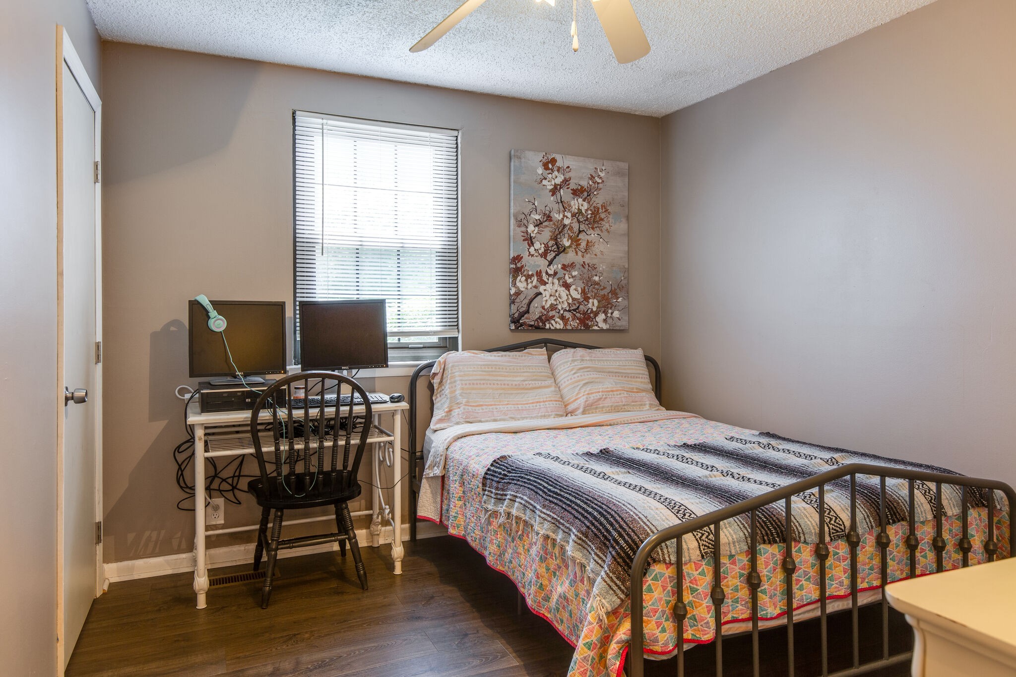 7813 Chester Road Fairview, TN 37062 - Photo 9 of 23 a bedroom with a bed and wooden floor