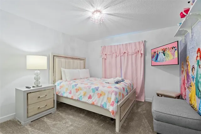 a bathroom with double sink and a mirror
