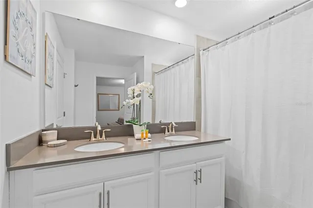 a view of a living room with furniture and a rug