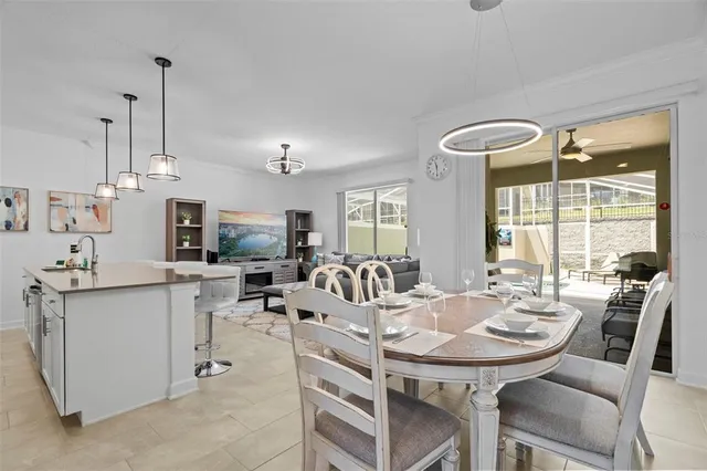 a bedroom with a bed and a lamp on table