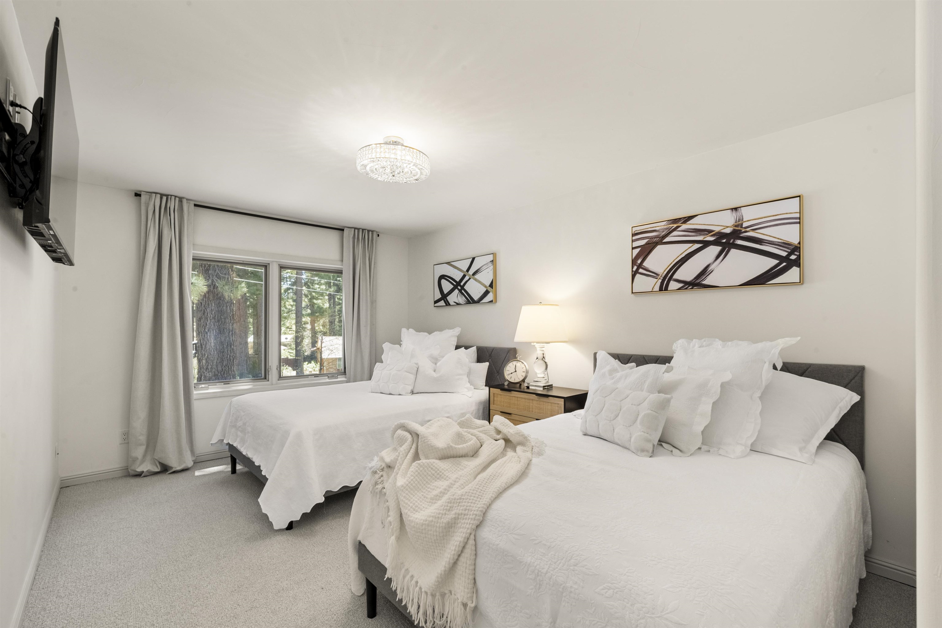 325 Winding Way Incline Village, NV 89451 - Photo 16 of 28 a bedroom with bed and a window