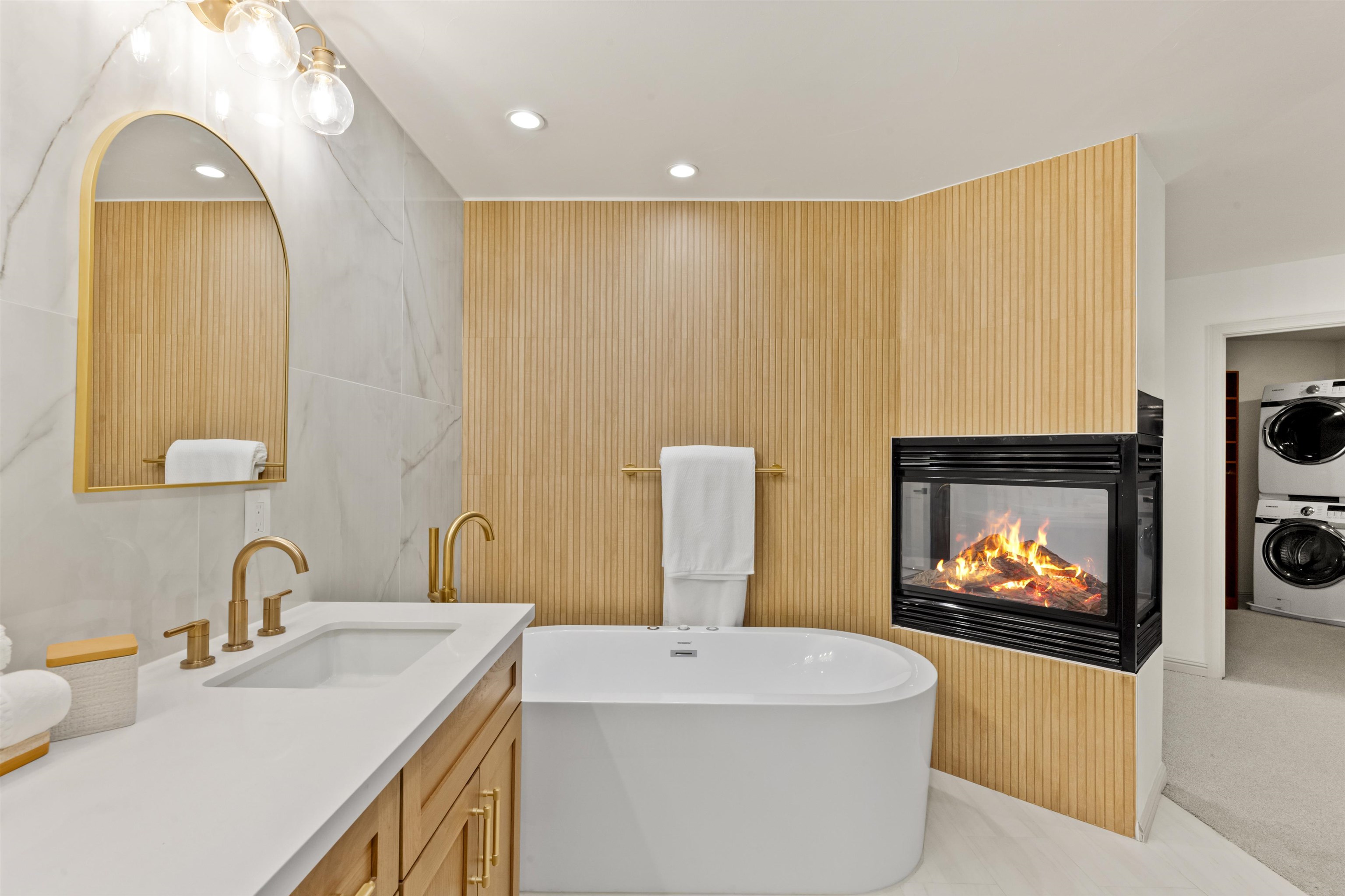 325 Winding Way Incline Village, NV 89451 - Photo 19 of 28 a bathroom with a sink a mirror and a bathtub