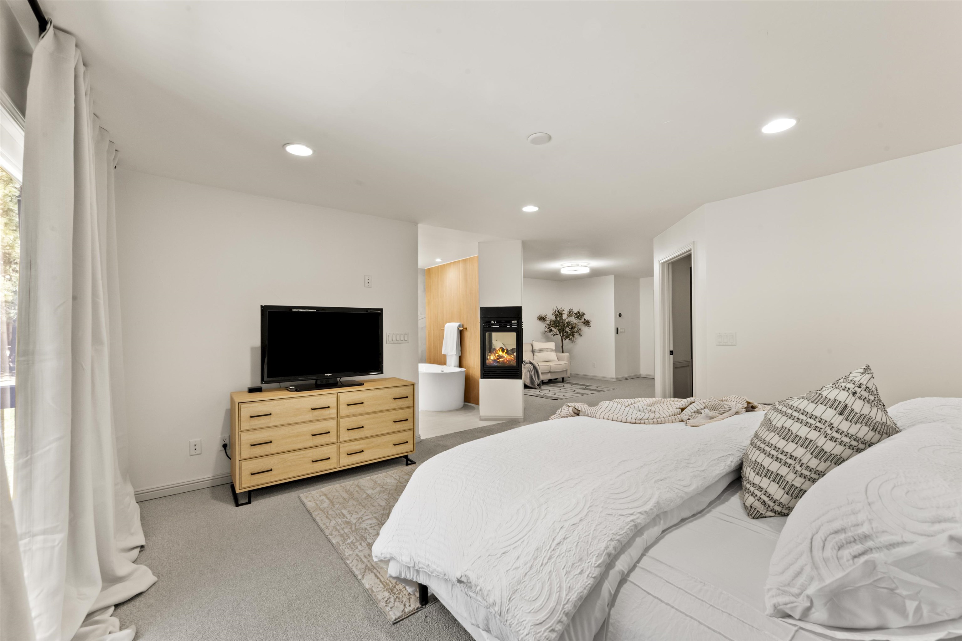 325 Winding Way Incline Village, NV 89451 - Photo 22 of 28 a bedroom with bed and tv