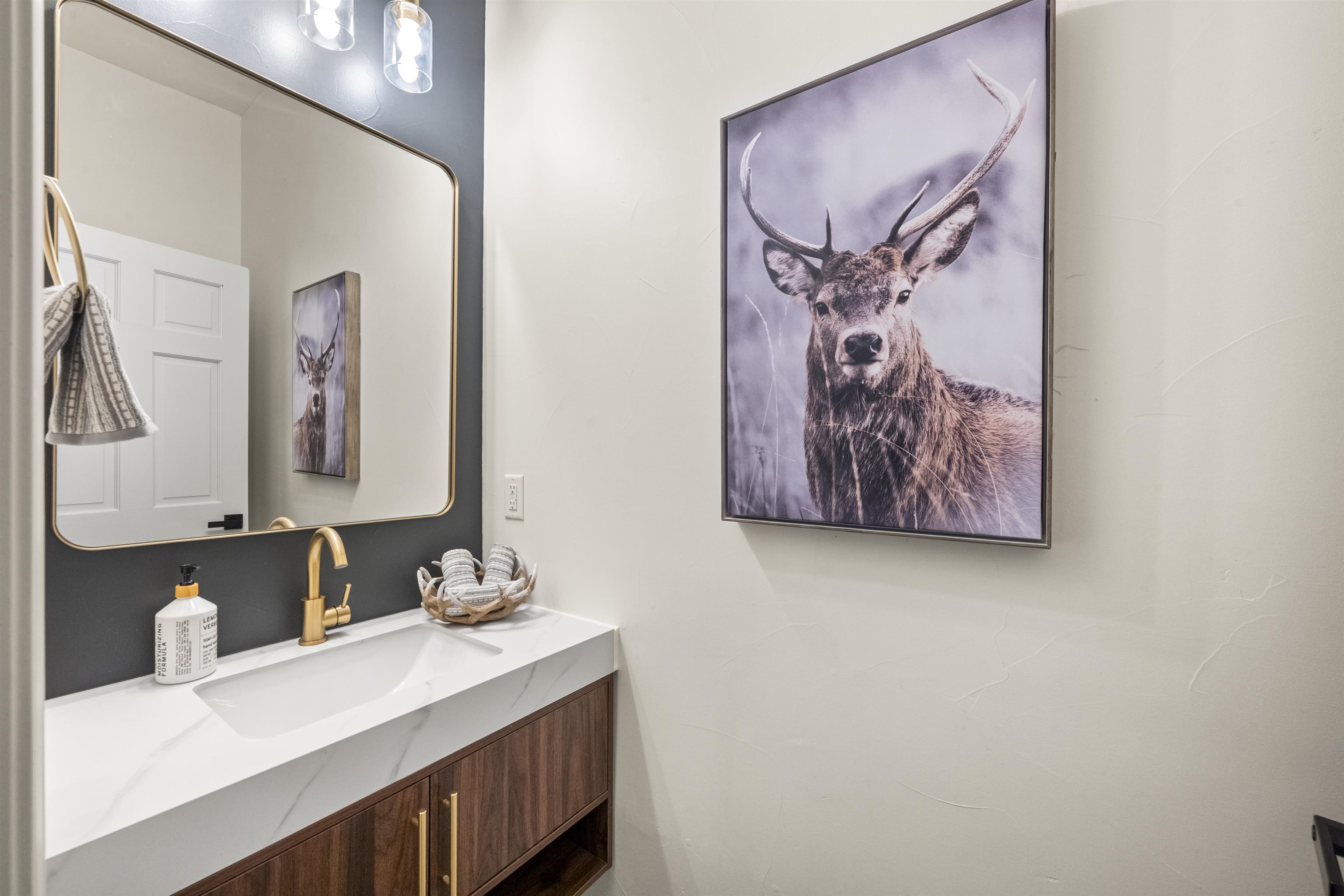325 Winding Way Incline Village, NV 89451 - Photo 4 of 28 a bathroom with a sink and a mirror