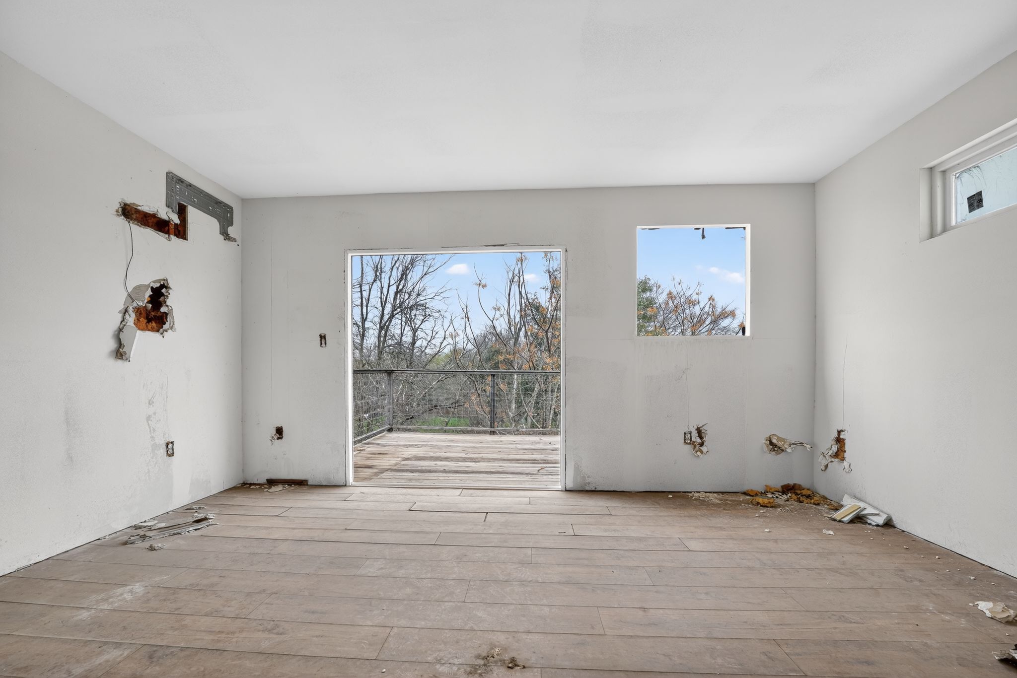 11223 Tom Sassman Road Austin, TX 78747 - Photo 31 of 40 Spare room with hardwood / wood-style floors