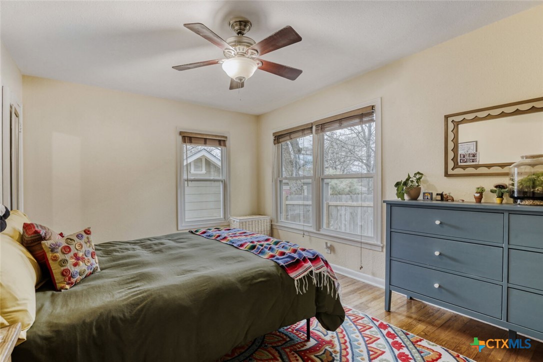 3307 Larry Lane Austin, TX 78722 - Photo 14 of 27 a bedroom with a bed and a window