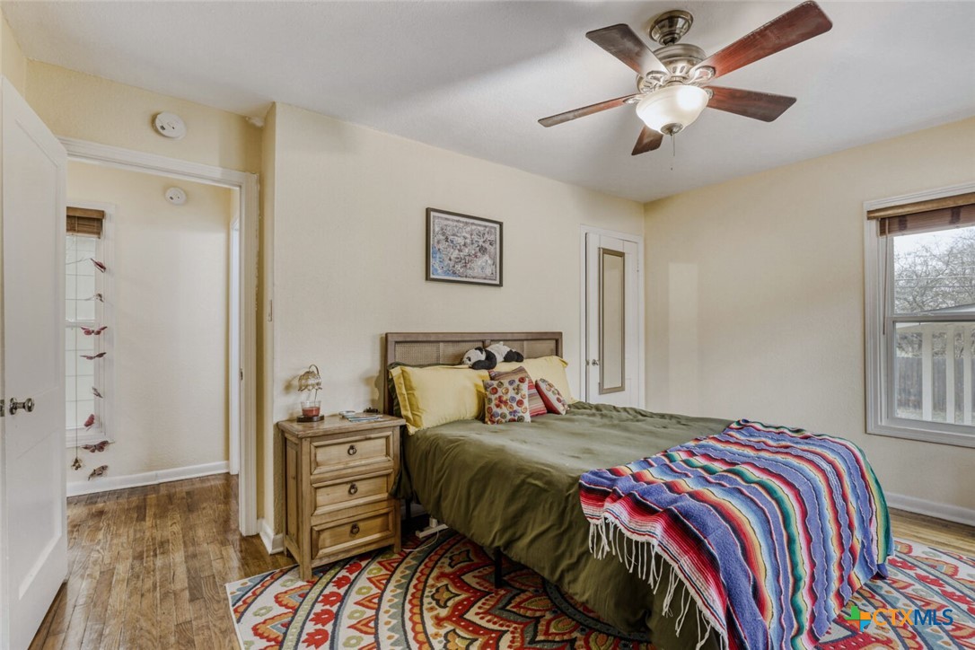 3307 Larry Lane Austin, TX 78722 - Photo 15 of 27 a bedroom with a bed and a window