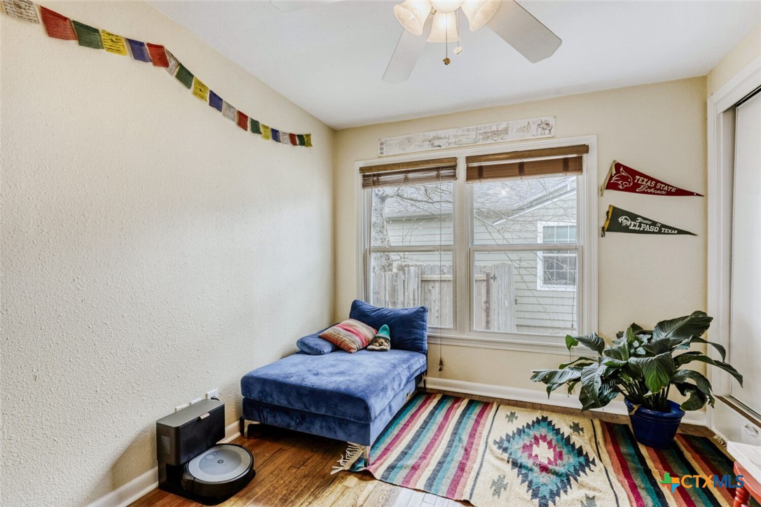 3307 Larry Lane Austin, TX 78722 - Photo 22 of 27 a bedroom with a bed and a window
