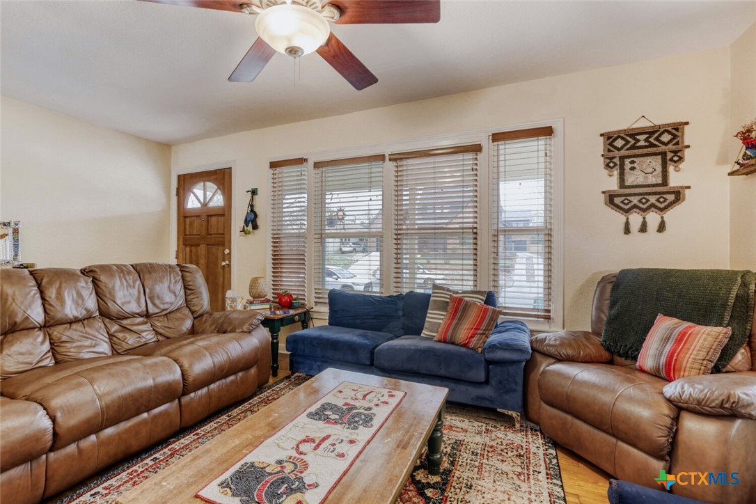 3307 Larry Lane Austin, TX 78722 - Photo 4 of 27 a living room with furniture and a large window