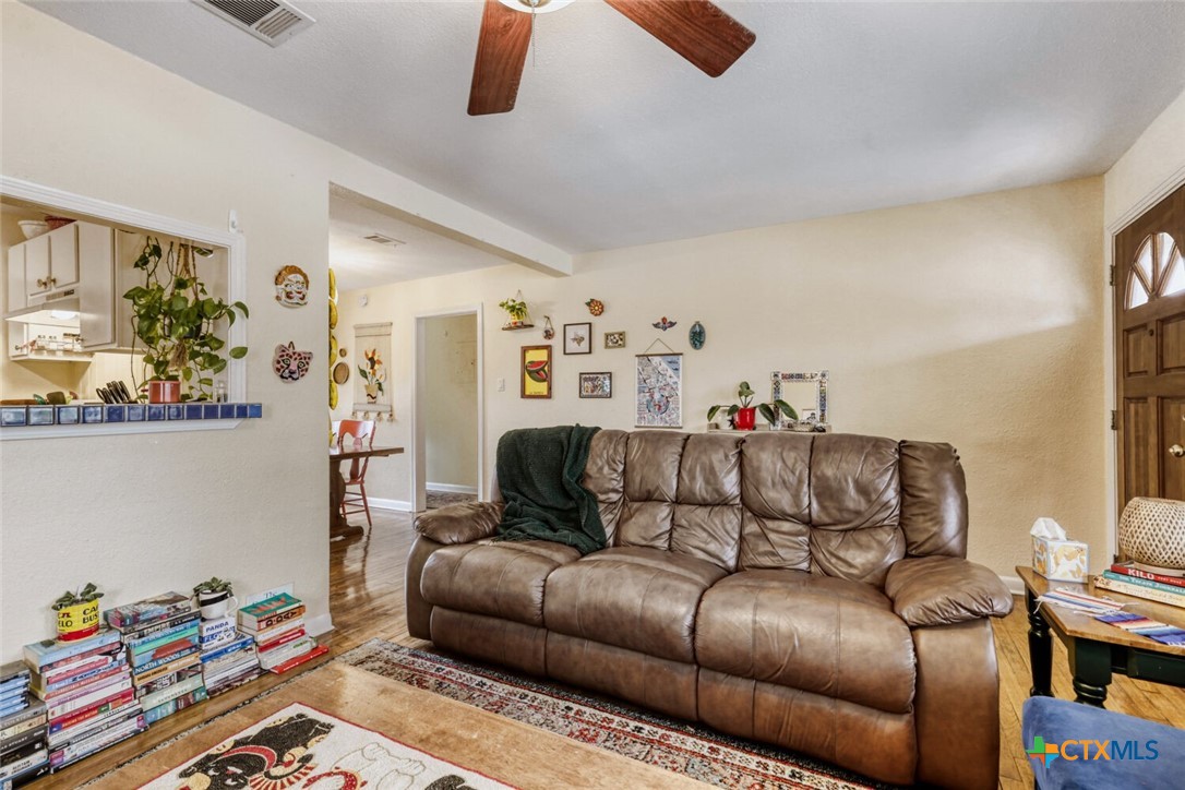 3307 Larry Lane Austin, TX 78722 - Photo 5 of 27 a living room with furniture and a couch