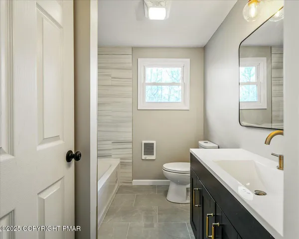 a bathroom with a sink and a toilet