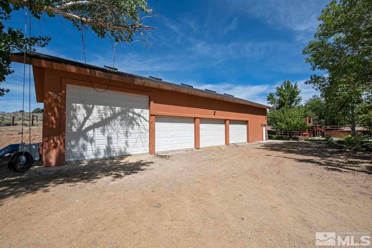 15871 Rocky Vista Road Reno, NV 89521 - Photo 28 of 33 a view of a house with a outdoor space and windows