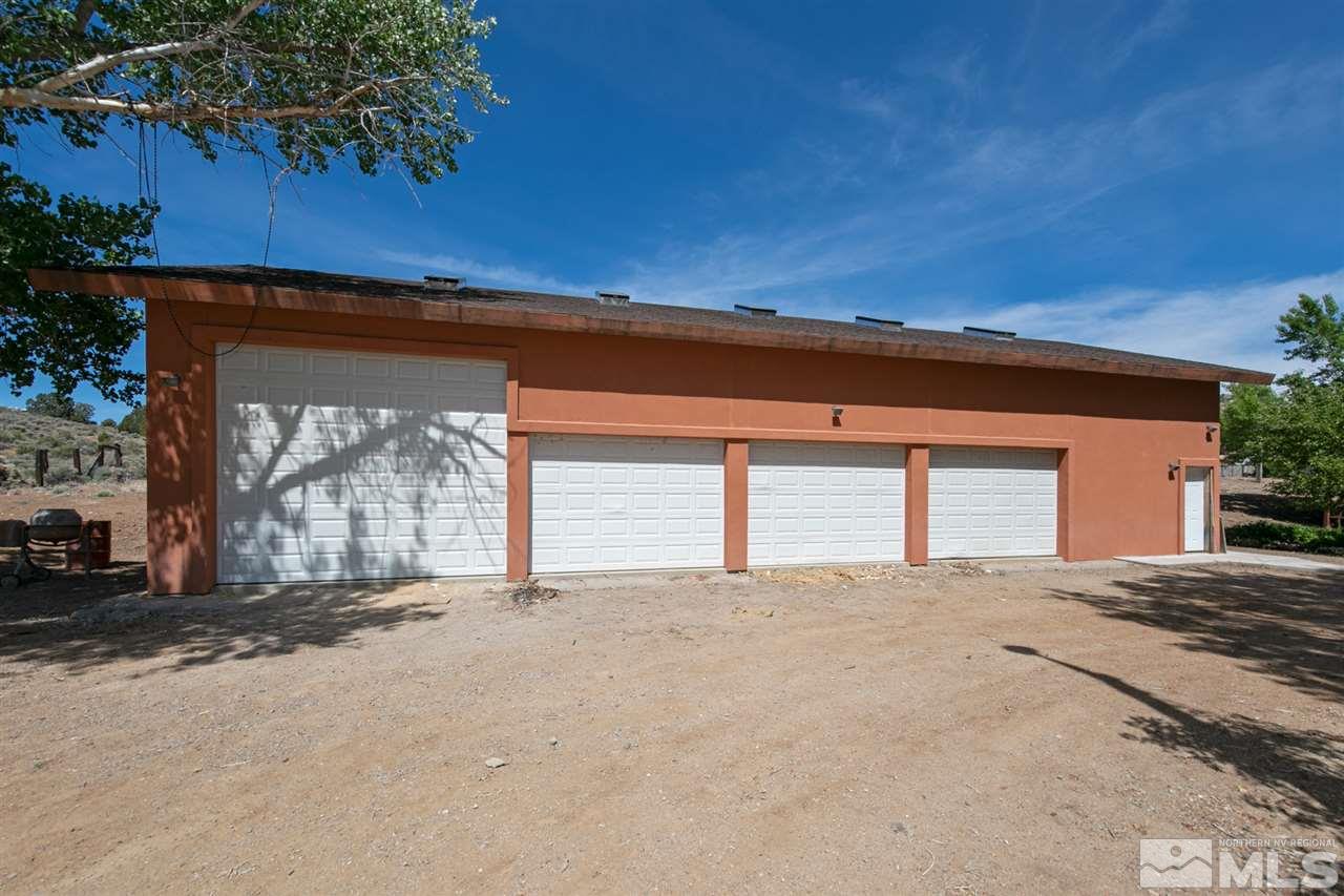 15871 Rocky Vista Road Reno, NV 89521 - Photo 3 of 33 a view of a house with a yard and garage