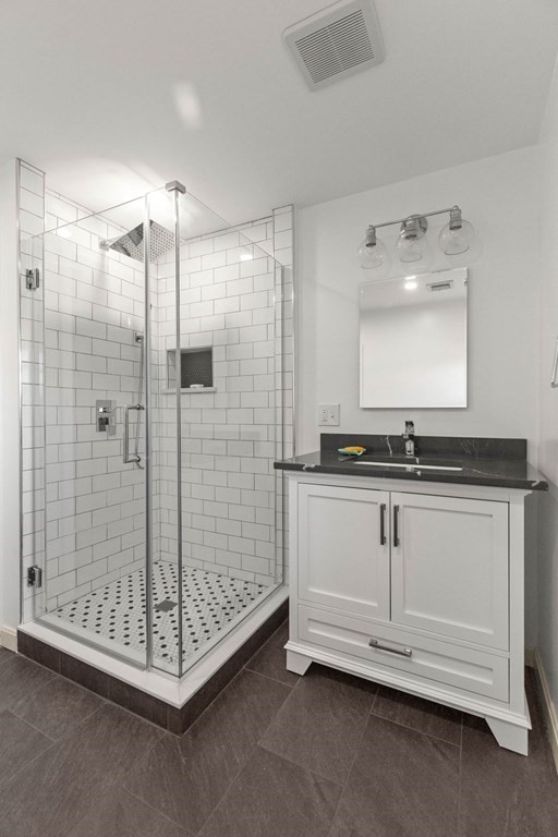 27 Brush Hill Road Merrimac, MA 01860 - Photo 11 of 26 a bathroom with a shower and a sink
