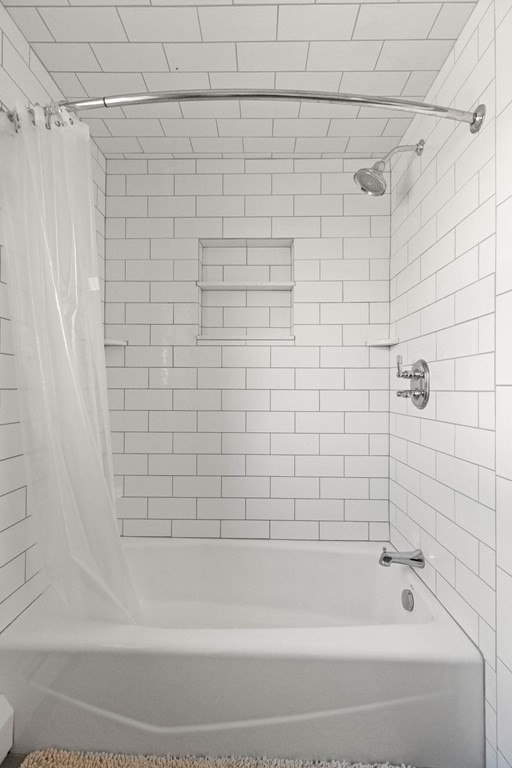 27 Brush Hill Road Merrimac, MA 01860 - Photo 18 of 26 a bathroom with a shower and a bathtub